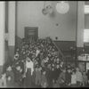 Seward Park, children in entrance to Children's room, "Waiting their turn to exchange their books, 4 p.m."