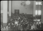 Seward Park, children in entrance to Children's room, "Waiting their turn to exchange their books, 4 p.m."