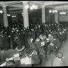 Tremont, interior views, a January evening,  showing readers filling tables and standing in line