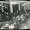 Tremont, interior views, a January evening,  showing readers filling tables and standing in line