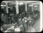 Tremont, interior views, a January evening,  showing readers filling tables and standing in line