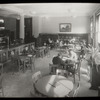 Tremont, interior views, Adult reading room, sun coming in on a few readers at tables