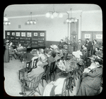 Webster: Interior views, Man plays piano to accompany woman singing at a "Slavia" (Bohemian Club) Meeting