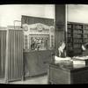 Webster: Interior views, Czech charging desk, marionette show in the background