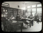 Webster: Interior views, men reading Czech magazines and newspapers
