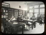 Webster: Interior views, men reading Czech magazines and newspapers