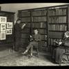 Webster: Interior views, Three readers in the Czech reference corner,, exhibit case at right