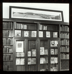 Webster: Interior views, exhibit of fine Czech editions and printing, panoramic view of Prague on case above exhibit of books