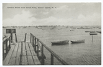 Crook'sPoint from Great Kills, Staten Island, N.Y. [wooden pier and rowboats.]