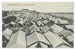 Woodland Beach, S.I., Camping Grounds (tents on beach with pier in distance