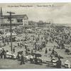 On the Sand, Midland Beach. Staten Island, N.Y.  [large pavilion, boardwalk, people, ferris wheel in far distance.]