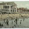 Water Maneuvering at Midland Beach, Staten Island, N.Y.  [card # upside down] [Pavilion with large flag, people in water, other buildings.]