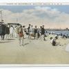 Scene on Boardwalk, Midland Beach, Staten Island,  N.Y.  [people sitting and strolling along shore and cottages; pier in distance.]