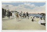 Scene on Boardwalk, Midland Beach, Staten Island,  N.Y.  [people sitting and strolling along shore and cottages; pier in distance.]