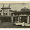 Ball Room In Happy Land Park  [people posed in front of Ball Room entrance, also circular concession stand with sign, The Only Candy Pop Corn Manufactured in Happyland South Beach S.I. ]