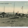 Camping Grounds, South Beach, S.I. (people in front of cottages with flags)