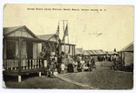 Street Scene Camp Warren, South Beach, Staten Island, N.Y.  [people posed in front of bungalows.]