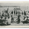 South Beach, Staten Island (people on beach and on float, pier in background)