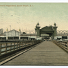 Pier Entrance to Happyland, South Beach, S.I.  [view from pier of buildings; one building advertising attractions such as 'free vaudeville']