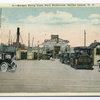 Bergen Ferry from Port Richmond, Staten Island, N.Y. [view of ferry slip from land with old cars and carriages in street as well as trolley track.]