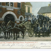 12479-The Last Call, Volunteer Fire Department, West Brighton, Staten Island [approx. 30 men in dress uniform standing by horse drawn wagon with wooden wheels, in front of firehouse]