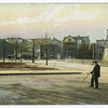 Truck No. 1 & Fire Bell, Stapleton, Staten Island [man posed in street, fire bell tower, horse & carriage, truck #1 not in picture]
