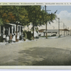 Lincoln Ave., Showing Washington Hotel, Midland Beach, S.I.N.Y. [people posed outside in front of porch, really interesting street scene]