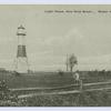 Light House, New Dorp Beach, Staten Island, N.Y. [beacon on wooden supports, man walking in meadow]