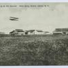 Miller Field, U. S. Air Service New Dorp, Staten Island, N.Y. [hangars, other buildings in distance, bi-plane in sky]