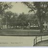 Washington Park, Stapleton, Staten Island, N.Y.  [view from center of park includes shops and stores on street]