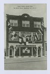 U.S.S. Staten Island Club, 98 Beach Street, Stapleton, S.I., N.Y. [building ext. draped with semaphore flags and sign 'United Seamen's Service, Inc., Staten Island Club']
