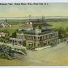 Midland Park Birds-eye View Armin Eitner, Prop., Grant City, Staten Island [wonderful artist-drawn aerial view of large entrance building, horse and carriage in road, trolley on one side of building, coal engine train at station on other side]