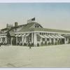 Tavern on the Green  [ext. with 30's-40's?  car out front and dog on lead attached to flag pole! ad text on back]