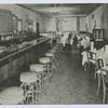 Black Hawk Cafe, Stapleton, Staten Island  [int. of bar and dining tables, ad text on back]