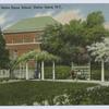 Lavelle Hall, Notre Dame School, Staten Island, N.Y.  [pathway with arbor and students on bench, building in background]
