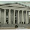 Front View of the Main Building, Sailors' Snug Harbor, Staten Island [people positioned on steps of colonnaded building]