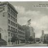 Business Centre, St. George, Staten Island, N.Y.[old car in street and 'Title Guarantee and Trust Company' painted on side of 6-story building]