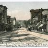 Bay Street, looking North, Stapleton, Staten Island  [trolley tracks, lots of people on street, horses with carriages, shops]