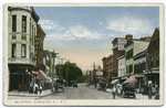 Bay Street, Stapleton, Staten Island, N.Y. [old cars in street, horse and wagon, people walking, red-striped awnings on shops, sign for hotel, sign on building  E.D. Wayman Dry Goods and Millinery]