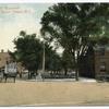 Water Street, Stapleton, Staten Island, N.Y.  [horses and wagons in street in front of park and village hall and shops]