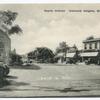 Guyon Avenue, Oakwood Heights, Staten Island  [shops and old cars parked along street and at railroad crossing]