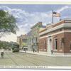 Bay Street from Canal Street, Stapleton, Staten Island, N.Y.  [boys in knickers on street, trolley car, shops on one side of street, edge of  Washington Park on other side]