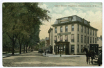 Canal Street, Stapleton, Staten Island, N.Y. [Staten Island Savings Bank buillding on corner, Washington Park across street, old gas street light, horse and carriage, brick street]