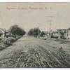 Bayway Avenue, Tottenville, N.Y.  [homes along dirt street with 2 people posed on side]