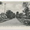 Guyon Avenue, Looking South from R. R. Station, Oakwood Heights, Staten Island,  N.Y. [street with old car, trees and two houses]