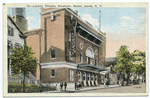 Liberty Theatre, Stapleton, Staten Island, N.Y.  [full ext. view with people strolling out front, billboards on sidewalk in front of building]