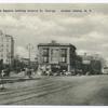 Tompkinsville Square looking toward St. George, Staten Island, N.Y.  [old cars, old gas lamps, brick street, large buildings]