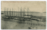 View of Water Front at Mariners(sic) Harbor, Staten Island, N.Y. [approx. 6 tall ships at  dock]