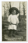 Buster' of Overlook Park, Prince(sic) Bay, S.I. (toddler in sun hat and dress)