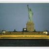 Statue of Liberty with Staten Island Ferry in foreground
